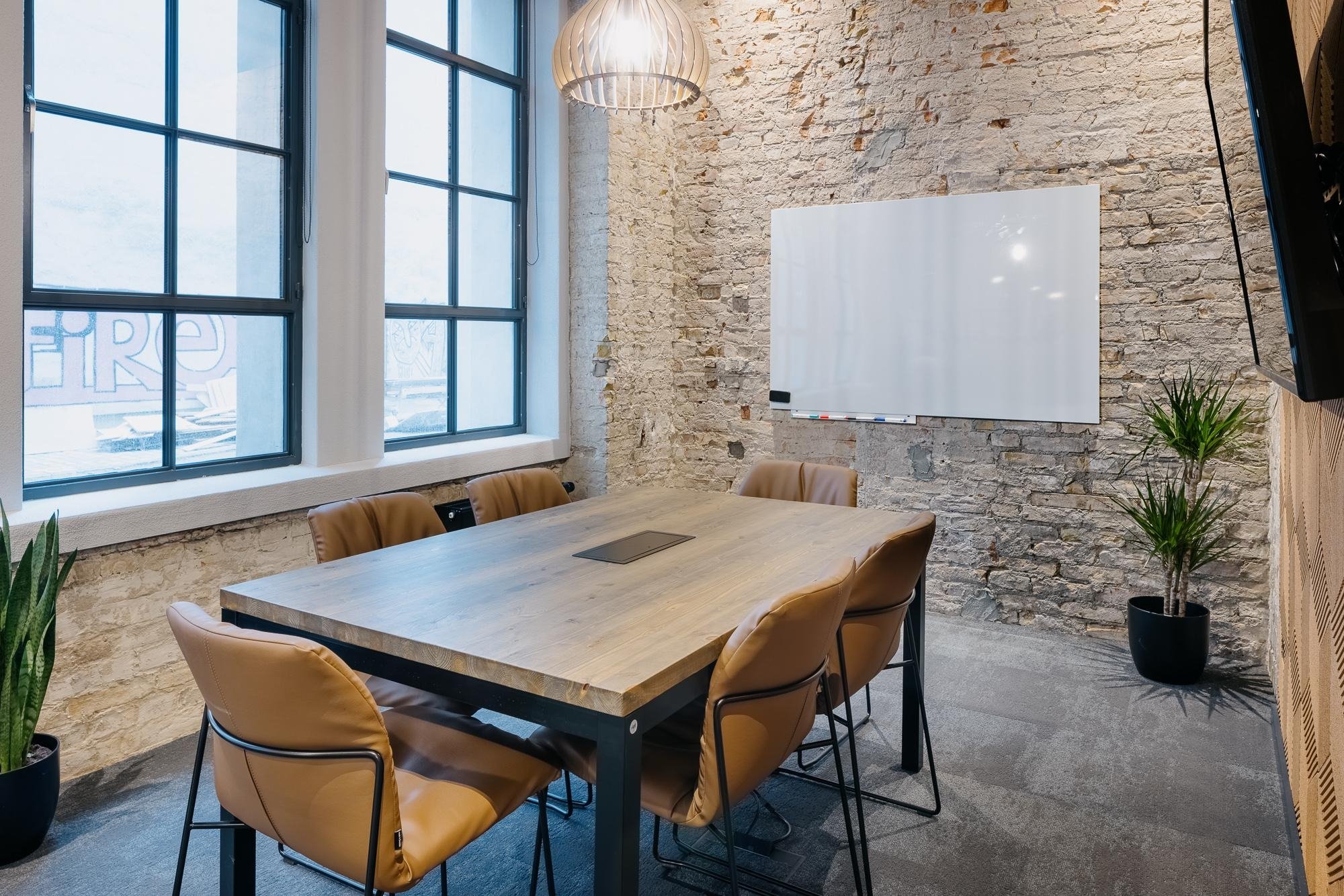 Rustic Looking Conference Room Meeting room with modern and rustic design bathed in natural light ...